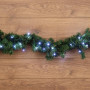 Еловый шлейф искуственный  2,7 м  белые светодиоды, с эффектом мерцания